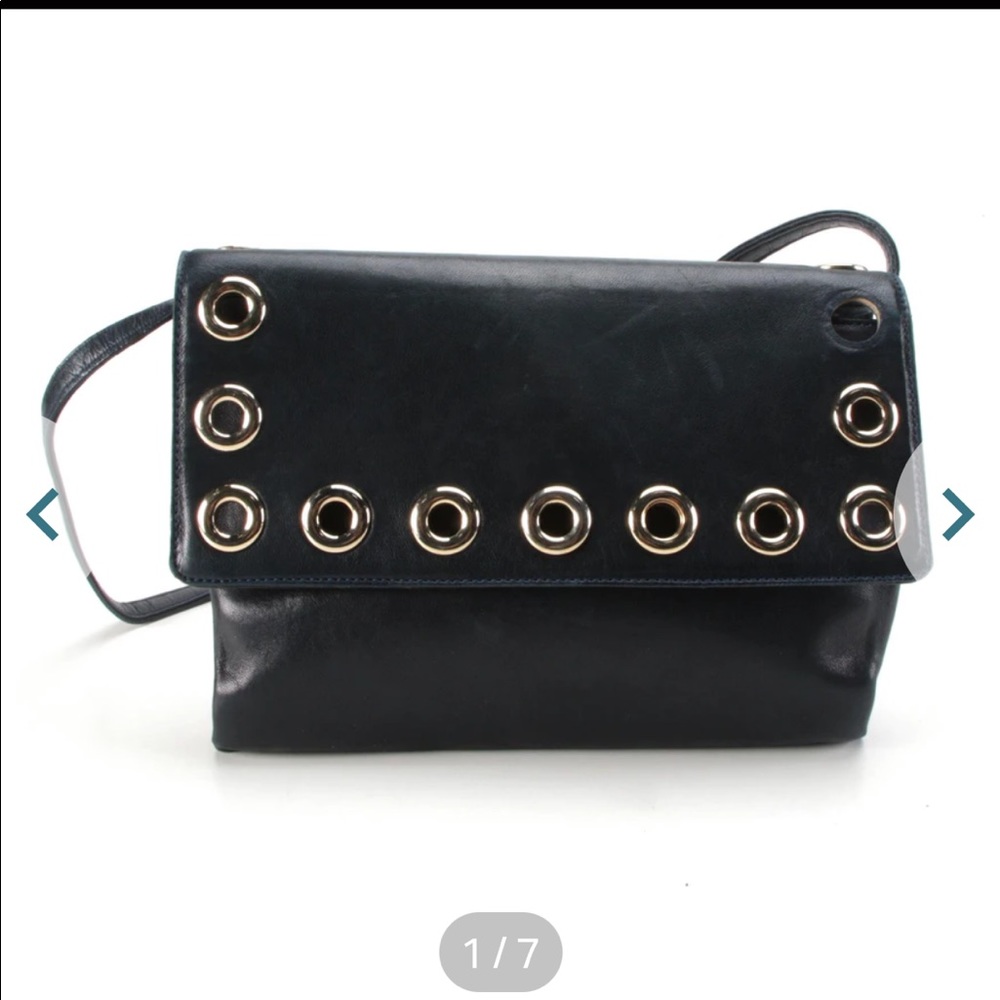 Givenchy Grommet Flip Bag in dark navy.  Leather